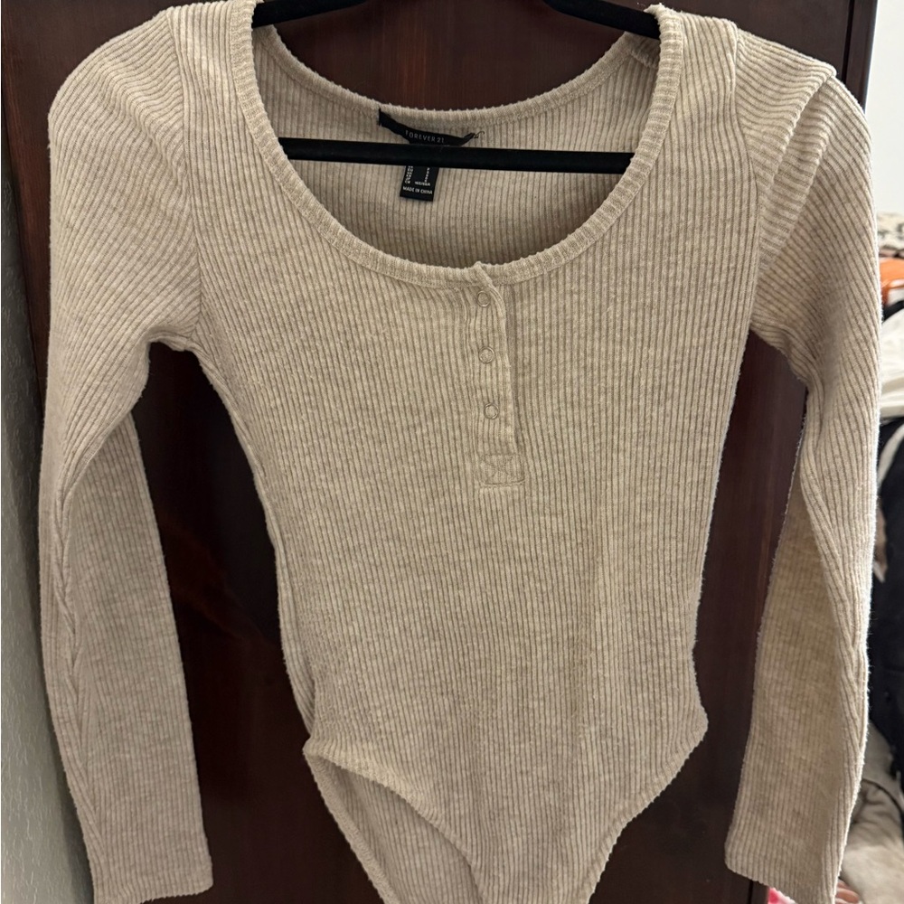 Forever 21 tan long sleeve ribbed bodysuit with button detail